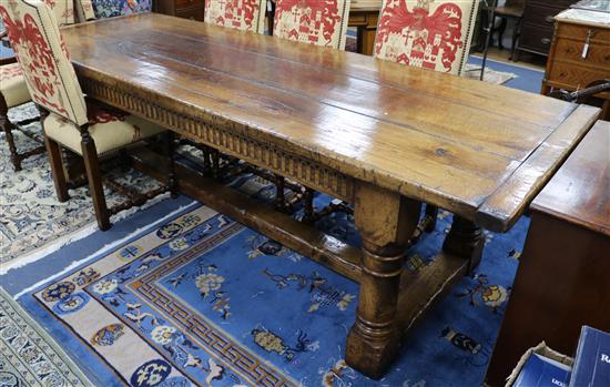 A 17th century style oak refectory table W.259cm